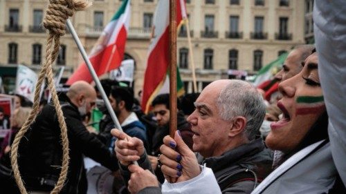 A protestoe holds a gallows rope during a rally against the Iranian regime, marking third ... A protestoe holds a gallows rope during a rally against the Iranian regime, marking third ...