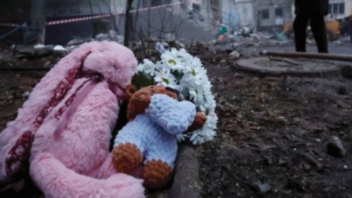Tributes are left at the site where an apartment block was heavily damaged by a Russian missile ...