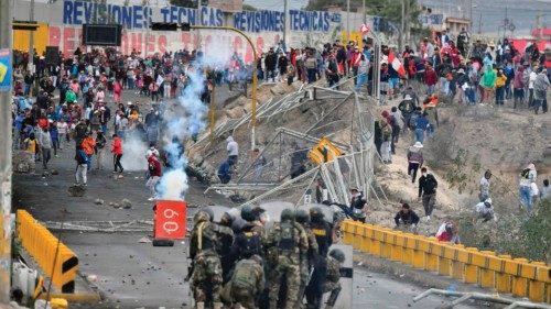 TOPSHOT - Demonstrators clash with riot police at the Añashuayco bridge in Arequipa, Peru, during a ...