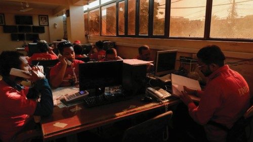 Volunteers of the Edhi Foundation, a non-profit social welfare programme, work at a communication ... Volunteers of the Edhi Foundation, a non-profit social welfare programme, work at a communication ...