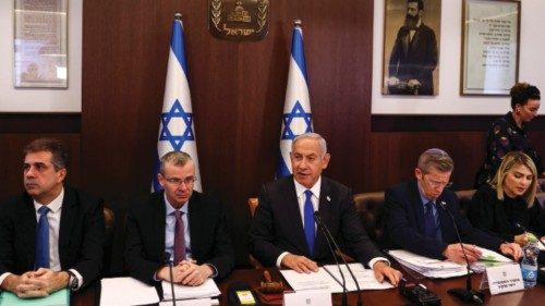 epa10437835 Israeli Prime Minister Benjamin Netanyahu (C) looks on as he convenes a weekly cabinet ...