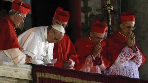 Pope Francis speaks from the central balcony of St. Peter's Basilica at the Vatican, Wednesday, ...