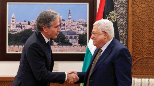TOPSHOT - Palestinian President Mahmud Abbas (R) and US Secretary of State Antony Blinken shake ...