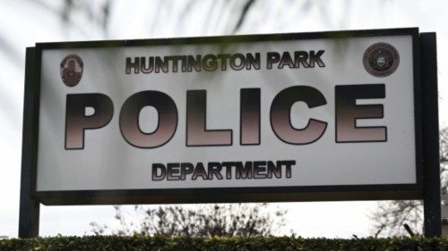 Signage is displayed outside the Huntington Park Police Department, where family and friends of ... Signage is displayed outside the Huntington Park Police Department, where family and friends of ...