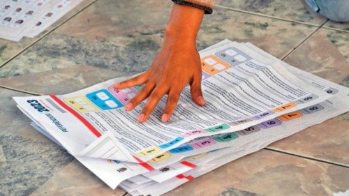 Election staffers count votes at a polling station during local elections in the parish of Nayon in ...