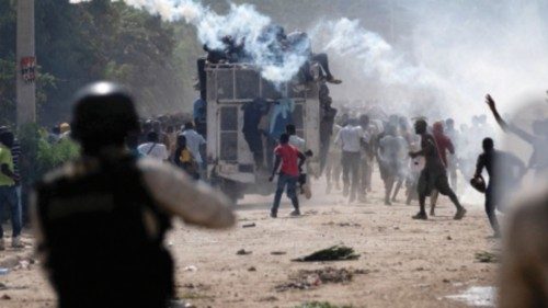 FILE PHOTO: Haitian National police officers deploy tear gas during a protest demanding the ...
