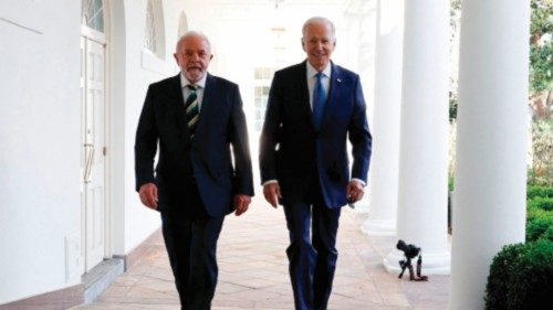 TOPSHOT - US President Joe Biden and Brazilian President Luiz Inacio Lula da Silva walk together ...