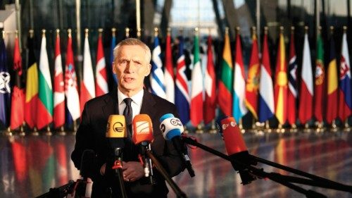 NATO Secretary General Jens Stoltenberg speaks to the press as he arrives for a two-day meeting of ...