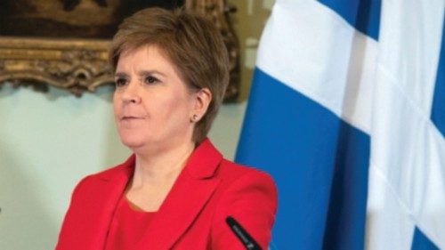 First Minister of Scotland Nicola Sturgeon reacts at a news conference at Bute House where she ...
