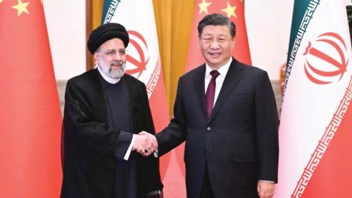 epa10466775 Chinese President Xi Jinping (R) holds a welcoming ceremony for visiting Iranian ...