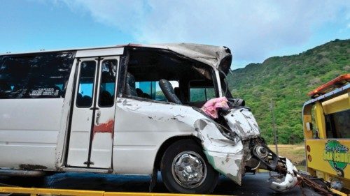 EDITORS NOTE: Graphic content / A minibus is towed away after being hit by a bus that plunged down a ...