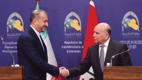 Iranian Foreign Minister Hossein Amir-Abdollahian shakes hands with Iraqi Foreign Minister Fuad ... Iranian Foreign Minister Hossein Amir-Abdollahian shakes hands with Iraqi Foreign Minister Fuad ...