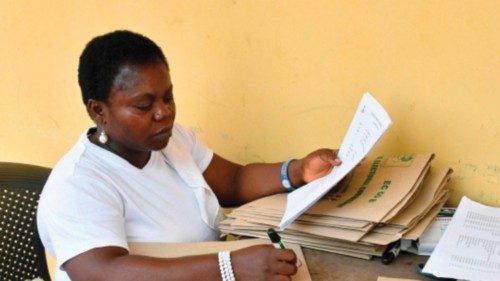 An official of Independent National Electoral Commission (INEC) writes on document ahead of the ... An official of Independent National Electoral Commission (INEC) writes on document ahead of the ...