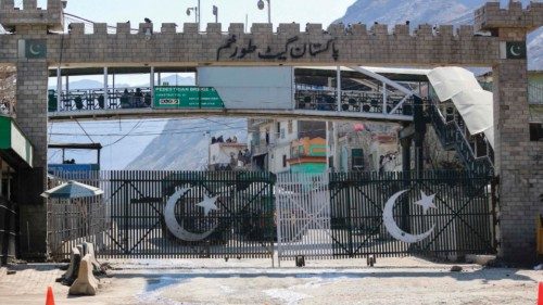 The closed Torkham gate is seen from the zero point at the Torkham border crossing between ...