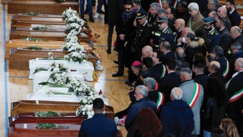 Mourners attend a lying-in-state for victims who died in a migrant shipwreck, in Crotone, Italy ...