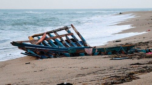 A photograph taken on February 28, 2023 shows parts of a migrants boat, washed on the beach, two day ...