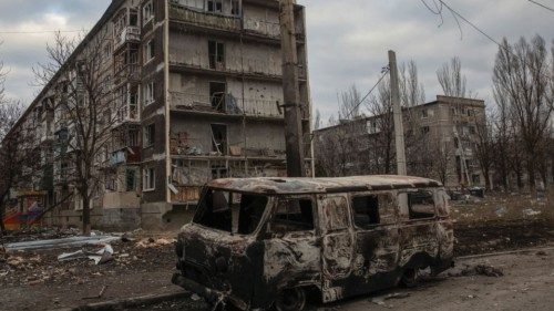 A general view shows an empty street and buildings damaged by a Russian military strike, as Russia's ...