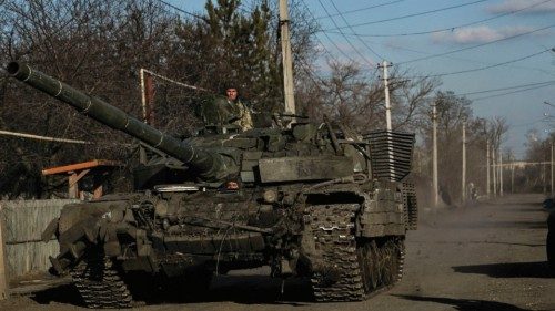 Ukrainian servicemen drive a tank in the village of Chasiv Yar, near the city of Bakhmut in the ...