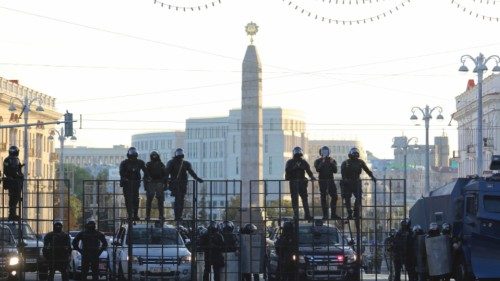 FILE PHOTO: Law enforcement officers block a street during an opposition rally to demand the ...