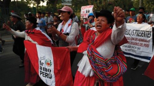 epa10503825 Protesters participate in a march against the president of Peru, Dina Boluarte, and her ...