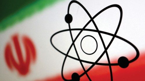FILE PHOTO: Atom symbol and Iran flag are seen in this illustration, July 21, 2022. REUTERS/Dado ...