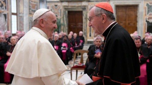Pope Francis greets Cardinal Pietro Parolin, Vatican secretary of state, during a meeting with ...