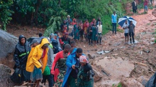 People walk up a hill in Blantyre on March 14, 2023, following cyclone Freddy's landfall. - Cyclone ... People walk up a hill in Blantyre on March 14, 2023, following cyclone Freddy's landfall. - Cyclone ...