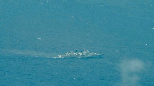 An aerial view taken on March 9, 2023 shows a vessel identified by the Philippine Coast Guard as a ...