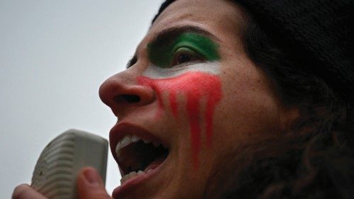 Activists from New York-based Iranian women's rights group group Woman Life Freedom attend a rally ...