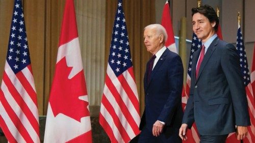 U.S. President Joe Biden and Canadian Prime Minister Justin Trudeau walk following their meeting, in ...