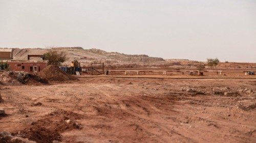 A general view of the previous location of the factory  with the residue dump behind near Arlit on ...