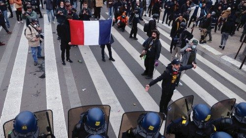 Protesters face off with french gendarmes during clashes at a demonstration as part of the tenth day ...