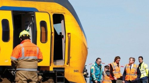 King Willem-Alexander of the Netherlands inspects the damage at the site where a passenger train ...