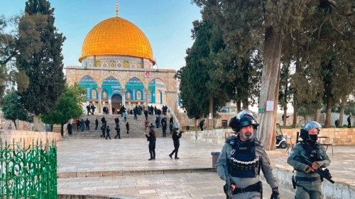 TOPSHOT - Israeli police walk inside the Al-Aqsa mosque compound in Jerusalem, early on April 5, ...