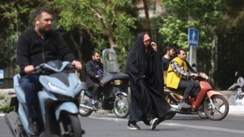 An Iranian woman walks in a street in Tehran, Iran, April 9, 2023. Majid Asgaripour/WANA (West Asia ...