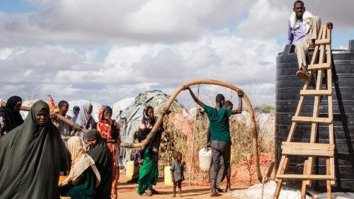 TOPSHOT - Somali refugees wait for the water distribution by French charity Doctors Without Borders ...