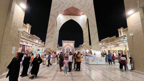 People visit the Global Village, a shopping, dining and entertainment complex in Dubai, on the eve ...