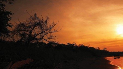 epa10585015 A sunset at the mouth of an estuary in the vicinity of the Bajamar area, west of San ...