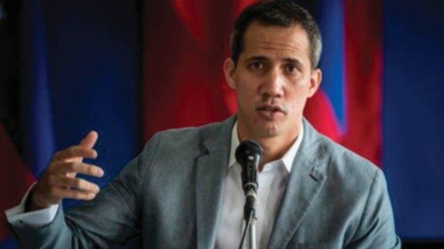 epa10320776 Venezuelan opposition leader Juan Guaido speaks during a press conference in Caracas, ...