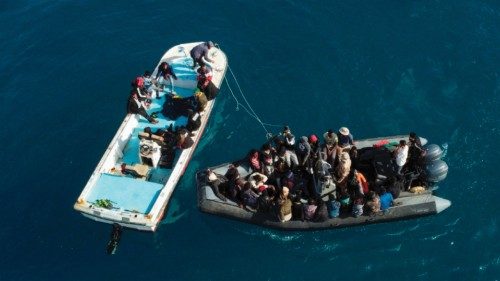 TOPSHOT - An aerial picture shows boats transporting migrants of different nationalities entering a ...