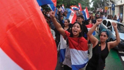 Supporters of Paraguay's presidential candidate for the Partido Cruzada Nacional political party, ...