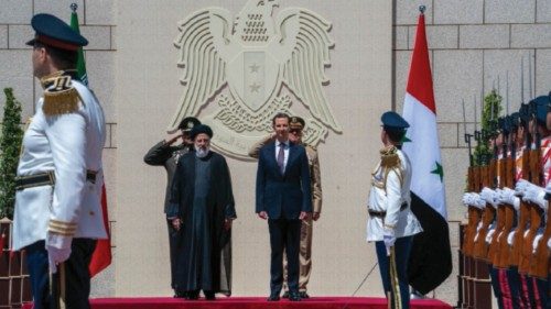Syria's President Bashar al-Assad welcomes Iranian President Ebrahim Raisi in Damascus, Syria May 3, ...
