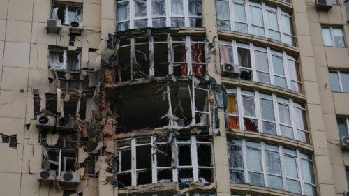 A view shows an apartment building damaged by remains of a suicide drone, which local authorities ...
