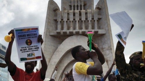 (FILES) People play vuvuzelas as they take part in a rally on Independence square in Bamako, on ...