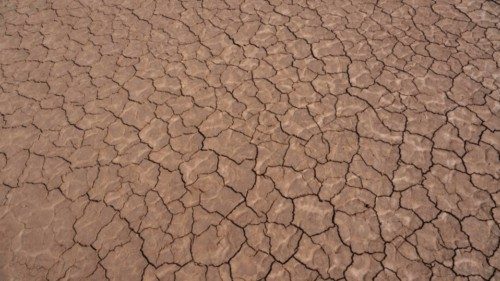 This photograph taken on April 25, 2023, shows the dry sand of Oued Tijekht in the Moroccan Sahara ...