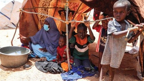 A displaced family stays at a makeshift shelter after flooding outside of Beledweyne, central ...