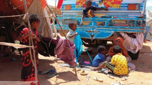 A displaced family stay at a makeshift hut after flooding outside of Beledweyne, central Somalia, on ...
