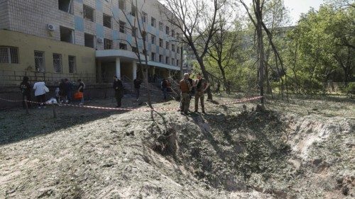 epa10666511 A view of a shell crater near a health center damaged in a missile strike in Kyiv ...
