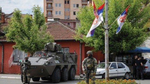Austria members of the NATO-led Kosovo Force (KFOR) stand guard in Zvecan, Kosovo, June 2, 2023. ...