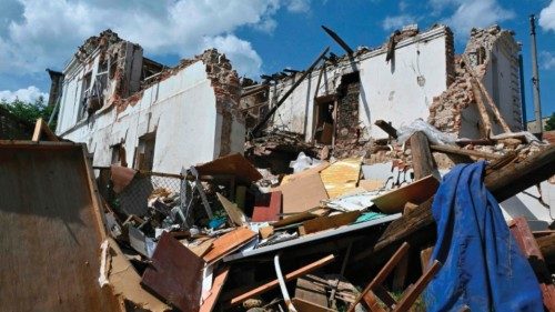 This photograph shows a destroyed building in the town of Kupiansk, Kharkiv region, on May 26, 2023, ...